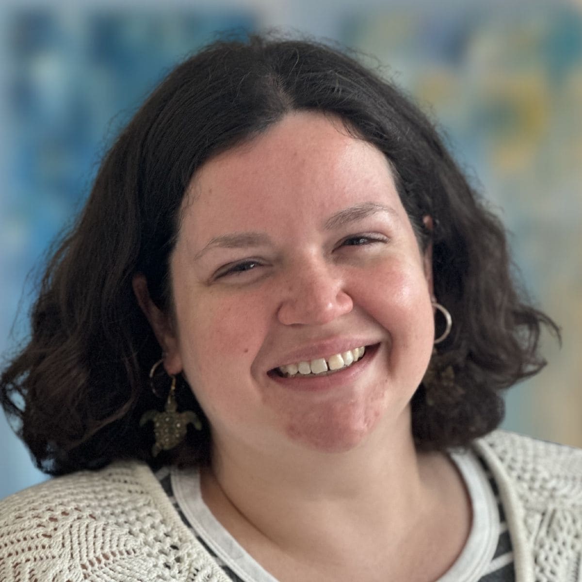 Natalie Baron, MSW, trauma therapist specializing in people-pleasing and identity exploration, smiling in a professional headshot.